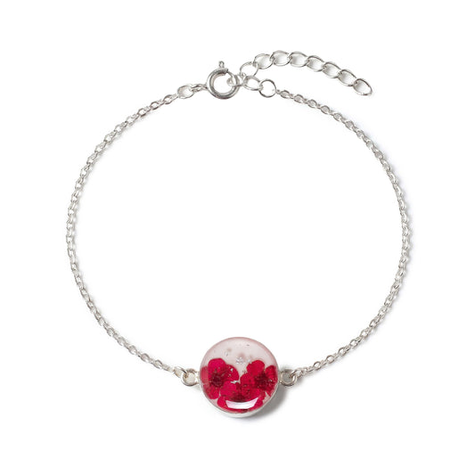 Armkette mit pinker Spiere